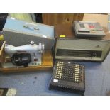 A Burroughs adding machine together with a Nord Mede radio, a Novum sewing machine and a WH Smith