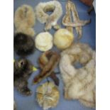 A quantity of vintage fur hats and stoles to include a lynx stole, a mink stole and red fox hats