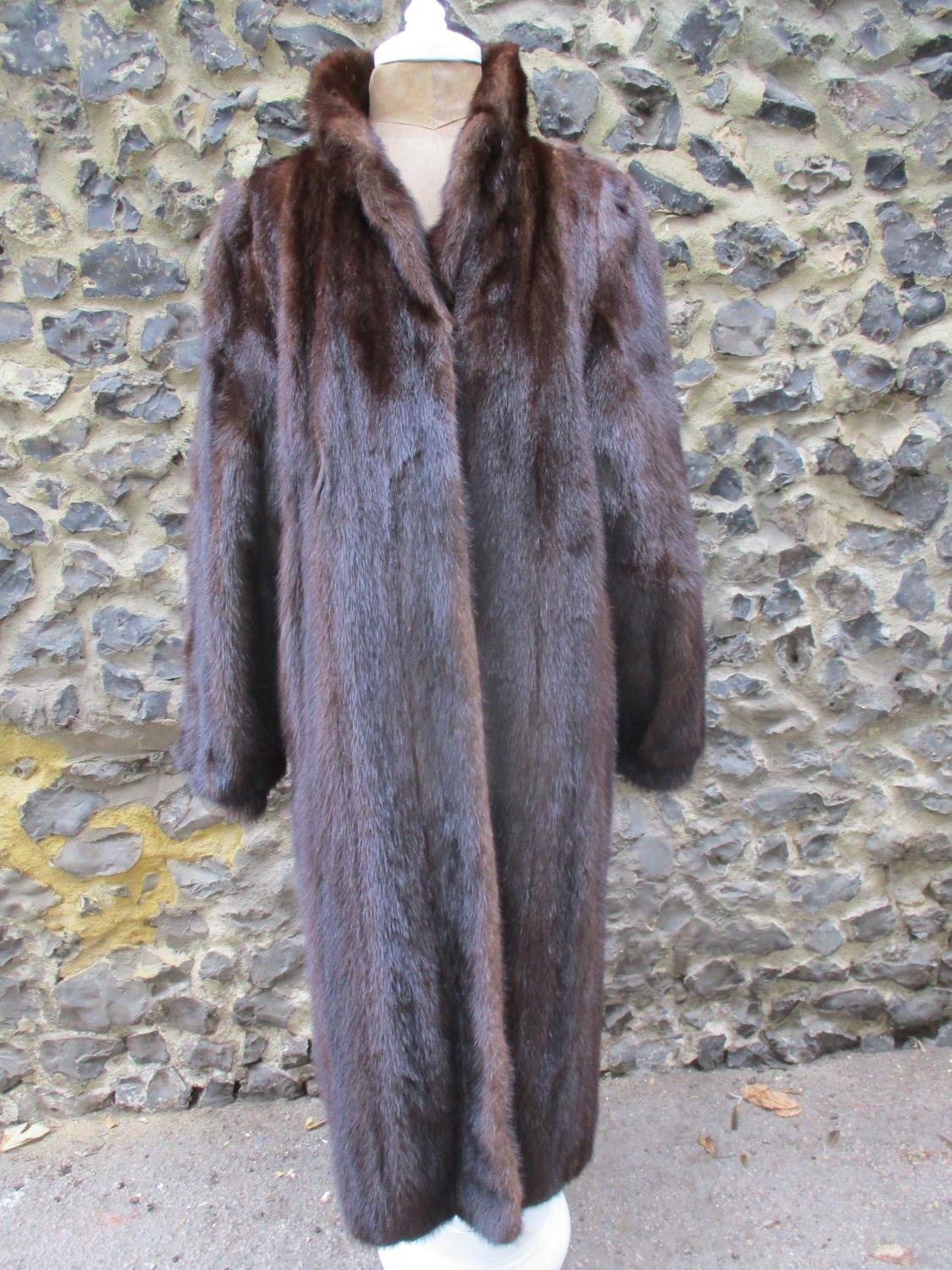 A vintage full length brown mink coat having a shawl collar, 38/40" chest x 47" long Condition: