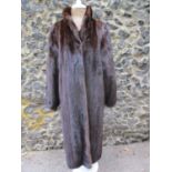 A vintage full length brown mink coat having a shawl collar, 38/40" chest x 47" long Condition:
