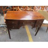 A 19th century mahogany kneehole desk having five drawers and tapered squared legs, 74.5 h x 93cm w