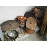 A good selection of copper and brassware to include graduated pans, jelly moulds, kettle, pots and