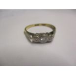 An 18ct white gold and 3 diamond ring, having a platinum illusion setting, stamped 18ct, ring size ,