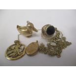 9ct gold to include a pendant, a duck charm, a locket, a fob set with cabochons and a yellow metal