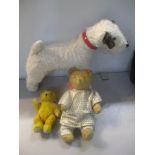 Two stuffed bears to include an early 20th century gold Mohair bear together with a fox terrier,