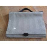 An Italian Nazareno Gabetteli black leather attache/laptop case having a black and brown chevron