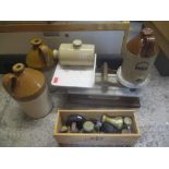 A set of Victorian weighing scales on an oak base, together with weights, a stoneware hot water