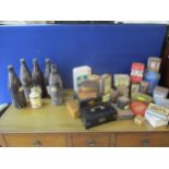 Vintage tins and decorative boxes together with vintage bottles Location: FSR