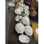 A Johnston Bros Eternal Beau pattern dinner service comprising approximately 64 pieces