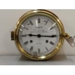 A German Wempe brass chronometer bulk head clock Location: SR