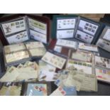 A quantity of 1930's and 1940's franked envelopes, 1970's-2000 First Day covers in albums, loose