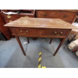 A 19th century mahogany side table with single drawer raised on reeded legs 75cm h x 86cm w x 49cm d