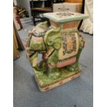 An Oriental painted terracotta garden seat in the form of an elephant, 56cm h Location: LWB