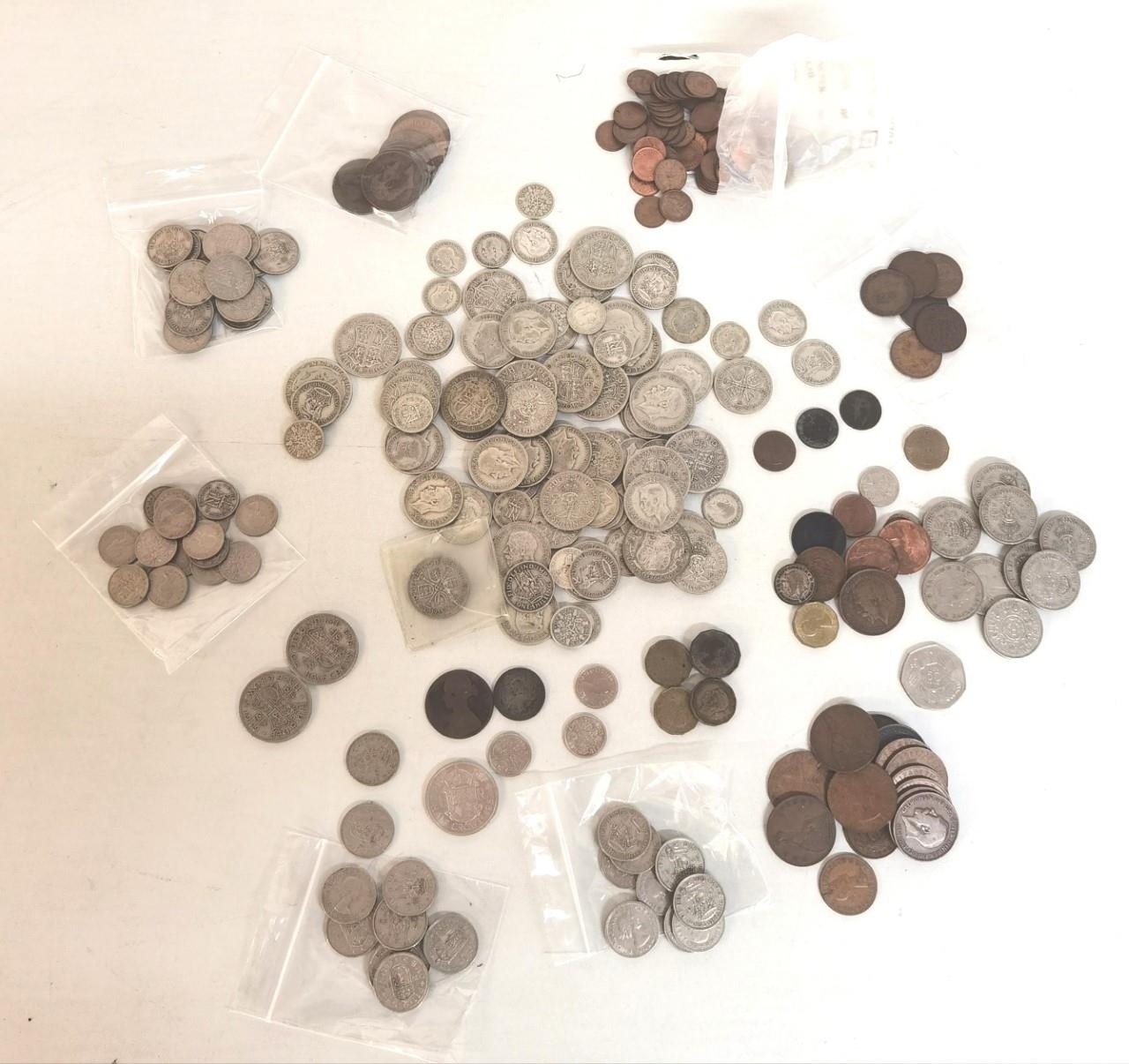 A large quantity of early to mid 20th century British Coinage to include half crowns, florins