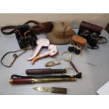 A mixed lot to include a three draw telescope by Dolland London, four pairs of binoculars to include
