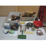 A miscellaneous lot of kitchenalia and various ornaments to include a flat iron and a wooden handled