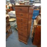 A modern teak pedestal chest of ten drawers 135cm h x 40cm w x 43cm d Location: LAM