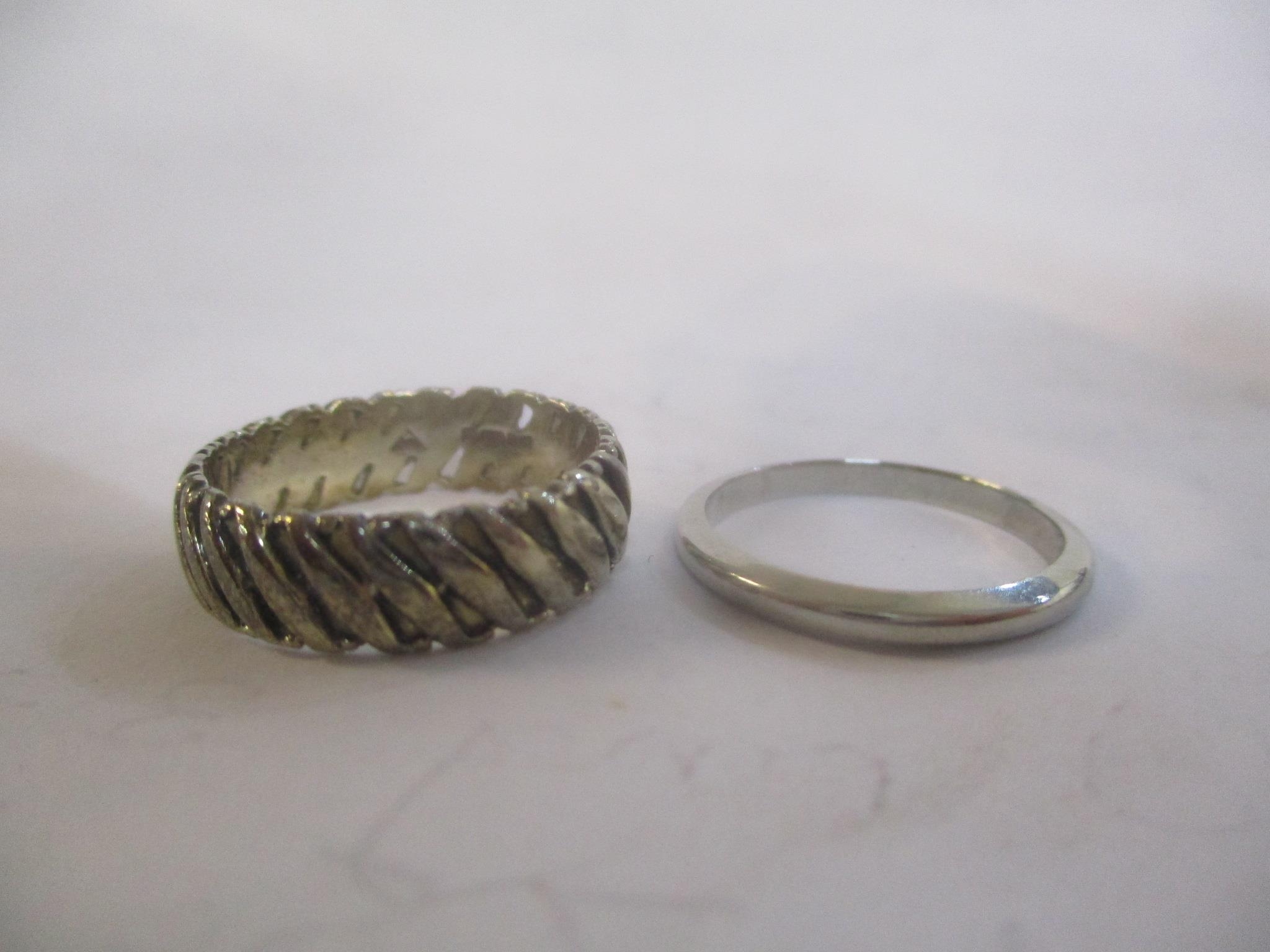 A 9ct white gold ring, 3.3g and an 18ct white gold ring, 1.75g