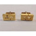 A pair of 14ct gold cuff links stamped 585, 13.6g Location: Cab