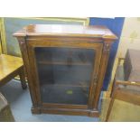 A late 19th century rosewood pier cabinet having two loose shelves and on a plinth base 94cm h x