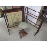 A Victorian rosewood music stool, an early 20th century firescreen and an early 20th century