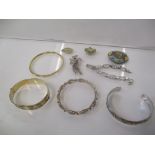 Silver and gold and costume jewellery to include Mexican brooch, bracelets, brooches and pendant