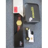 A gents Tissot wristwatch with brown leather strap in original packaging together with a limited