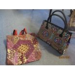 A Chinese style hand embroidered bag, and another embroidered bag