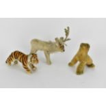 A Steiff seal with a label 17cm high, a reindeer 24cm high to top of antler, a tiger 28cm l