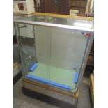 An ex John Lewis display cabinet with two sliding doors 135cm h x 92.5cm w