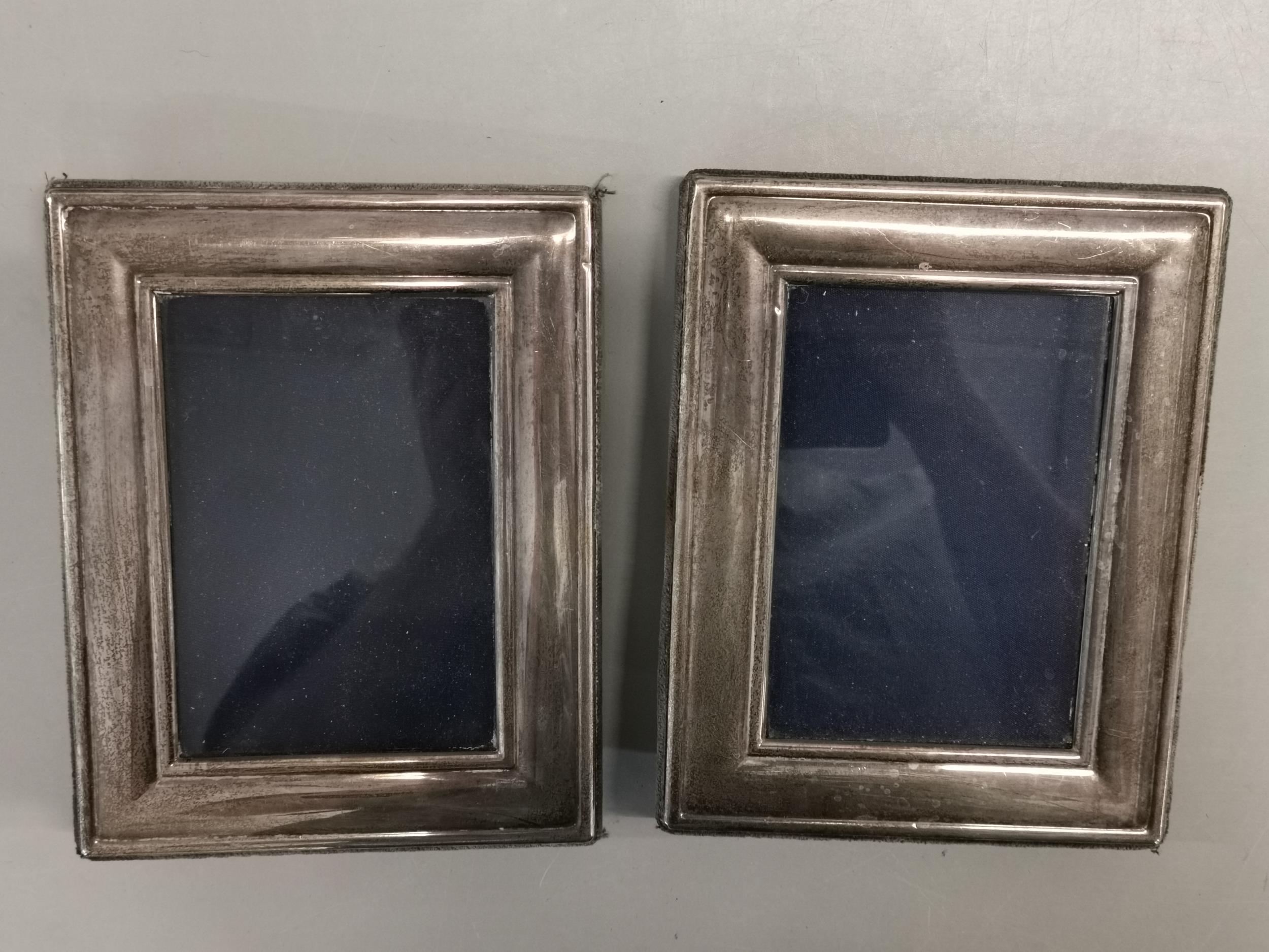 A pair of silver photo frames by Carrs of Sheffield, 18cm x 14cm Location: Port