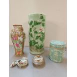 Three Oriental items to include a famille rose vase, a green glazed vase and a pot and cover A/F