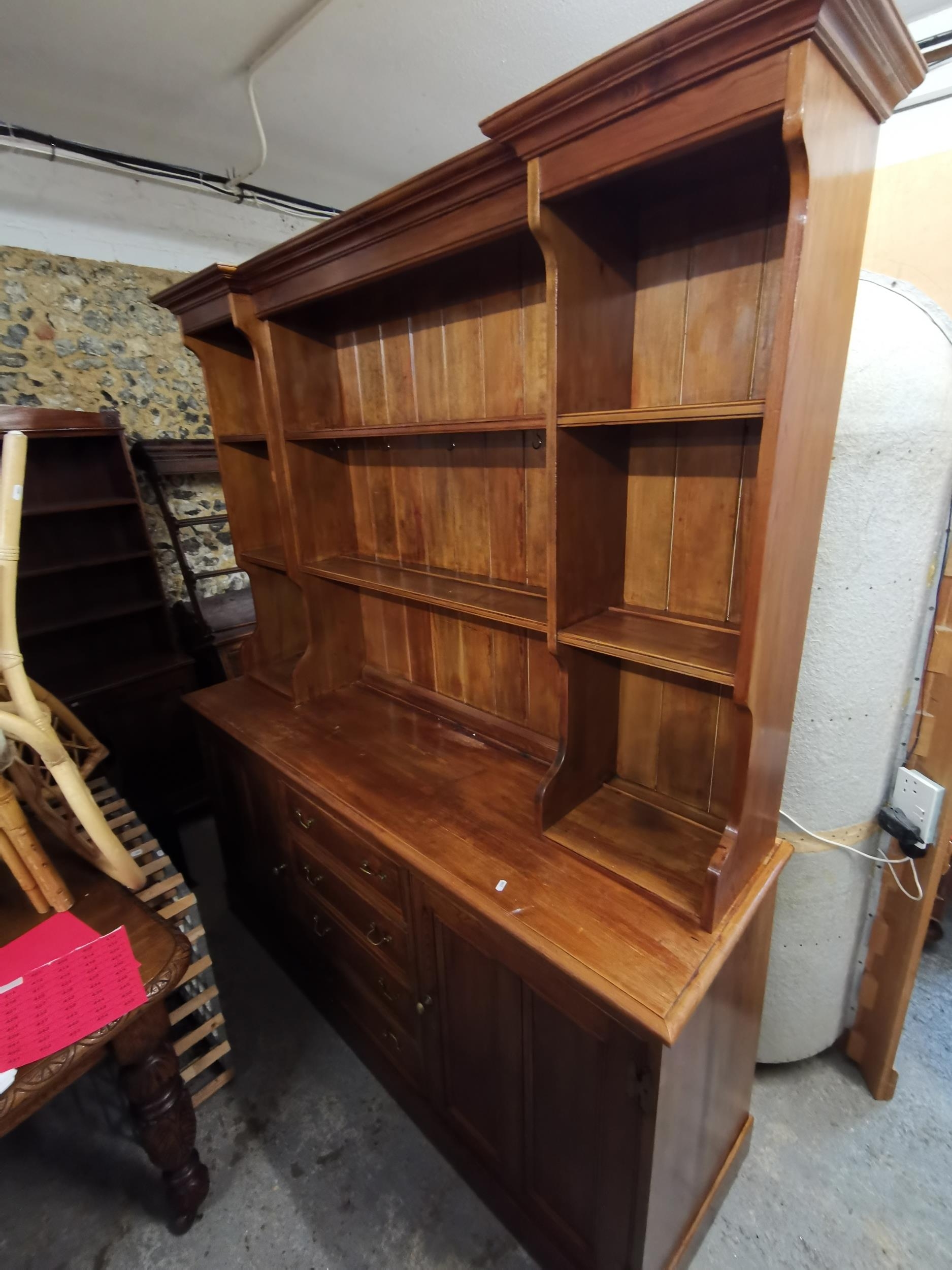 A stained pine dresser, 202 h x 170 w x 50cm d Location: G