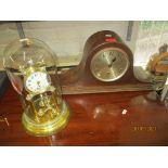 An early 20th century anniversary clock, and a 1930s oak cased mantel clock