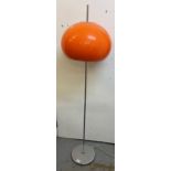 A 1970s mushroom standard lamp in the style of Harvey Guzzini having an orange shade and on a chrome