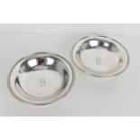 A pair of early 20th century Tiffany & Co silver footed dishes, each engraved with the initial 'B'