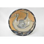 Andrew McGarva, b1956, a large stoneware bowl painted with two geese, with painted swan to base,