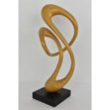 John Spielman, b. 1944, carved abstract sculpture on ebonized base, 36cm h