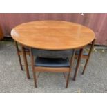 A 1960s Alexander Henry McIntosh of Kirkcaldy teak dining table and three chairs, the extending