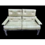 A 1960/70s Pieff Alpha sofa by Tim Bates, the leather and chrome sofa settee raised on tubular