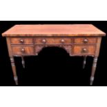 An early Victorian Gillows style mahogany side table with three short and one dep drawer, on