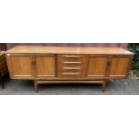 A mid 20th century G-Plan Fresco range teak sideboard, designed by Victor B Wilkins, with four