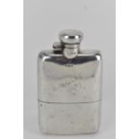 An early 20th century silver hip flask by Deakin & Francis, Birmingham 1924, with a twist hinged