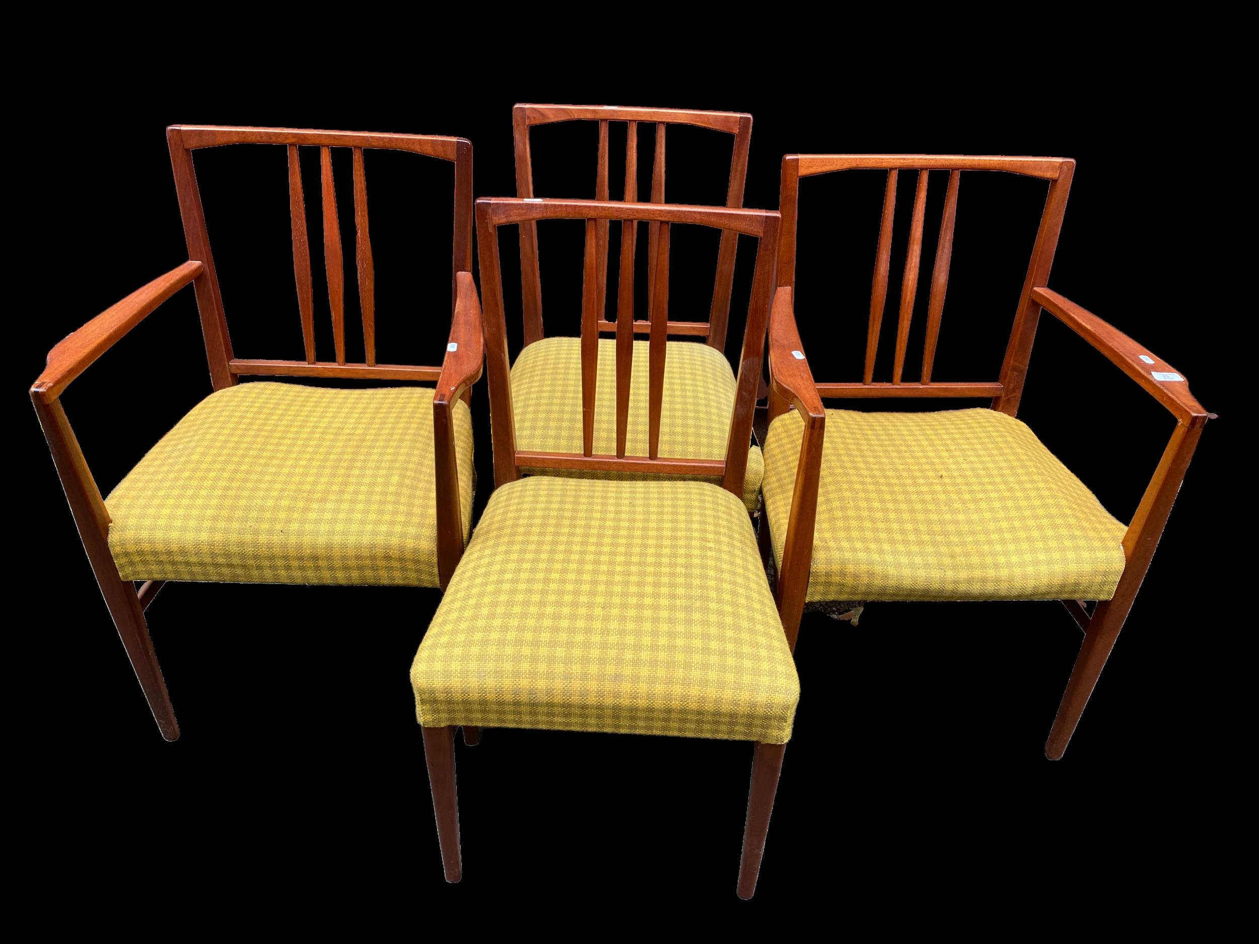 A set of four Gordon Russell 1950s teak dining chairs, model 6409 and 6408, designed by W.H Curly,