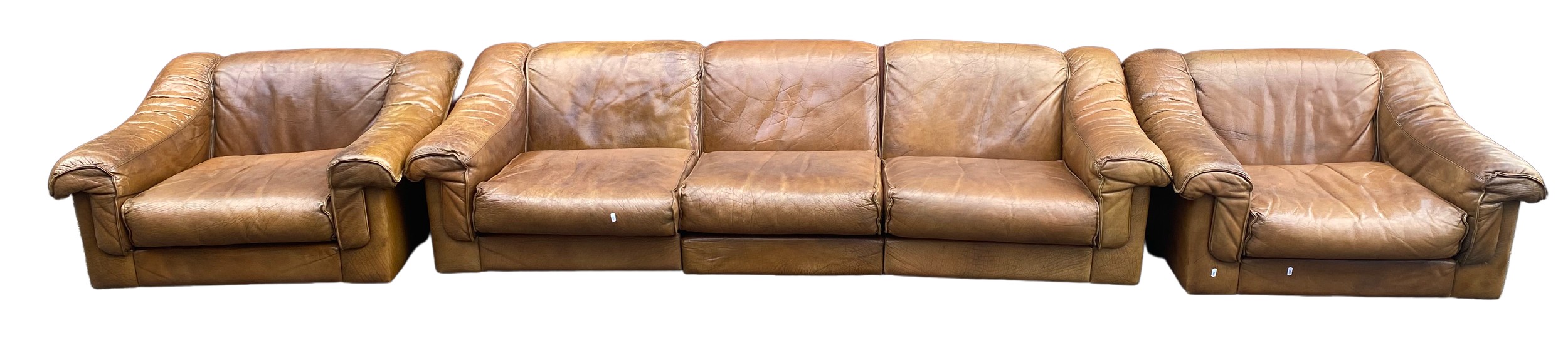A mid 20th century retro leather suite by Vatne Mobler consisting of a three seater sofa and two