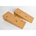 A pair of modern David Linley light oak door stops in the form of blocks of cheese, signed '