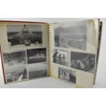 A photo album containing 1940s photographs of King George VI, Queen Elizabeth, Princess Elizabeth