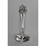 A mid 20th century Danish silver sauce ladle having a floral and pierced terminal, hallmarks for