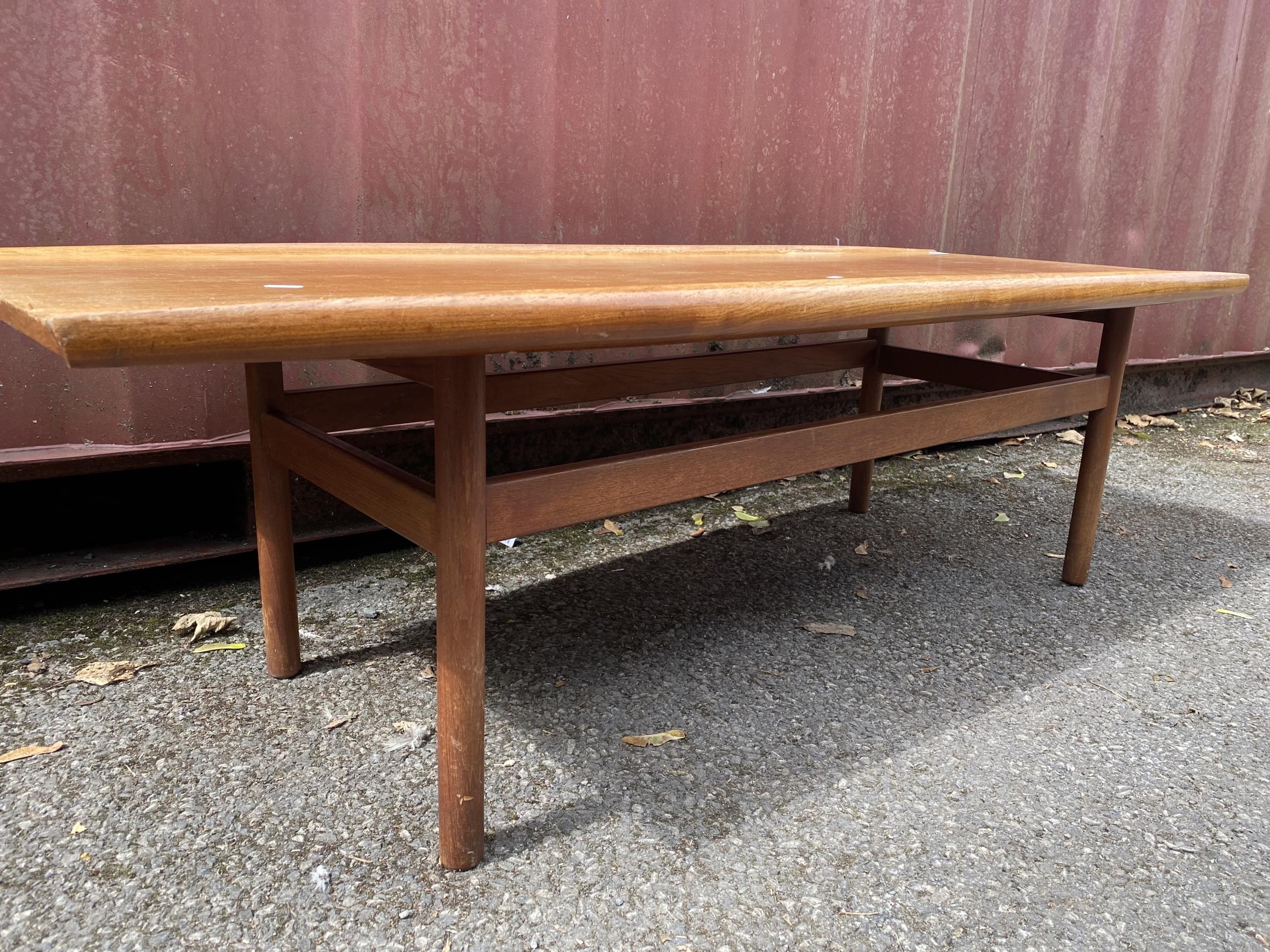 A Dalescraft mid 20th century teak coffee table of rectangular form with curved edges, 44.5h x 151. - Image 5 of 7