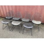 A set of seven vintage black wire metal chairs in the style of SM05 chairs by Cees Braakman &